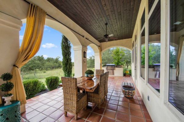 Outdoor Tuscan Style Dining Area for San Antonio Custom Home