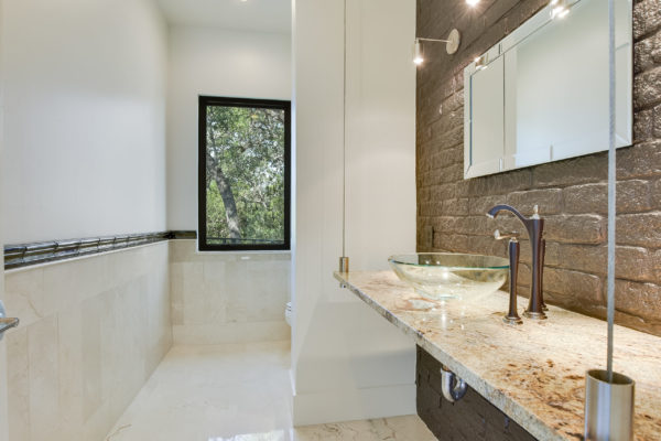 Glass Bowl Sinks in Bathroom of Cordillera Ranch House