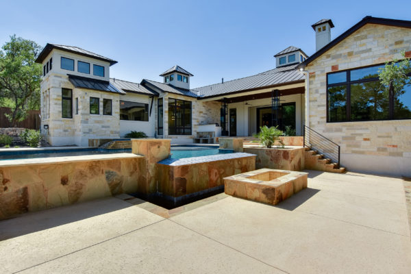 Back View of Mixed Texas Limestone House in Cordillera Ranch