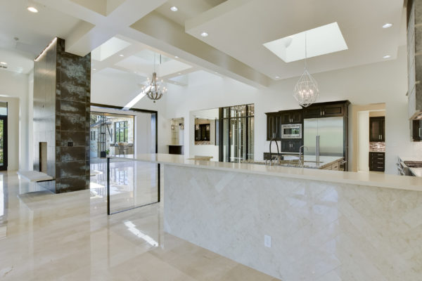Bright White Kitchen with Glossy Finished Tile in Cordillera Ranch