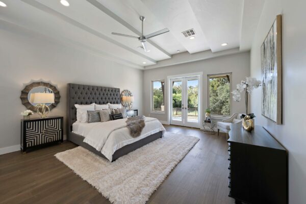 Bright White Modern Master Bedroom with Unique Ceiling